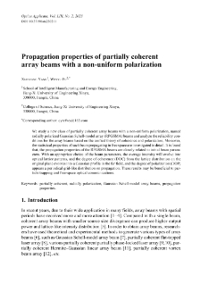 Propagation properties of partially coherent array beams with a non-uniform polarization